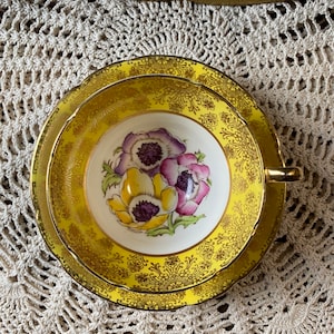Vintage Stanley bright yellow Handpainted tea cup and saucer Robinson artist signed pink purple yellow Pansy pansies collectible