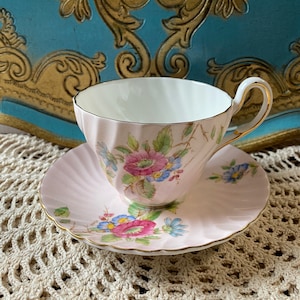 Vintage HandPainted pink foley artist Taylor signed pink floral tea cup and saucer swirl shaped tea set, English collectible bone china