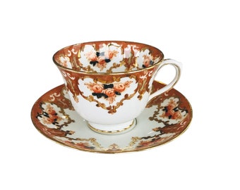 Collectible vintage Royal Albert crown china tea cup and saucer England, hand decorated with orange roses and gold trim,afternoon tea gift