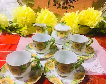 Sold individually vintage sunflowers hand painted with twisted handle porcelain Klausenburg , tea cups and saucers, creamer and sugar bowl,