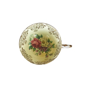 Vintage replacement double Paragon light yellow with central flowers cup orphan bone china England, replacement Paragon cup .