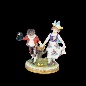 As is Vintage hand painted Dresden East Germany porcelain figurine 6” T dancing boy and girl , collectible vintage Dresden figurine.
