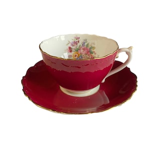 Coalport burgundy red tea cup and saucer with artist signed floral bouquet, English bone china