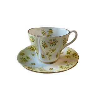 Royal Albert Debutante Series Radiance yellow floral tea cup and saucer