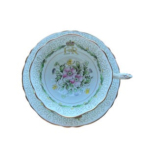 Double warrant paragon tea cup and saucer to commemorate the coronation of Queen Elizabeth II, royal tea cup, ER paragon