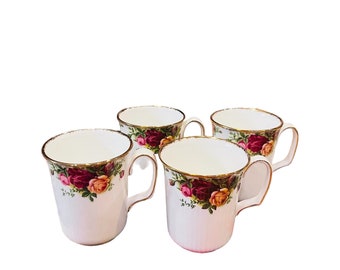 Price for each.. Vintage Royal Albert old Country Rose mugs, bone china England. Pink roses and gold trim. First quality.
