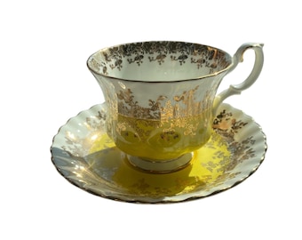 As is - royal Albert regal series yellow tea cup and saucer with gold edges