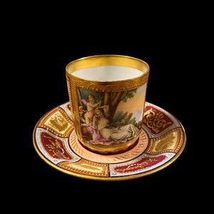 Very rare Antique Vienna signed Handpainted red and gold lady figure and angel espresso demitasse coffee cup and saucer, raised gold,