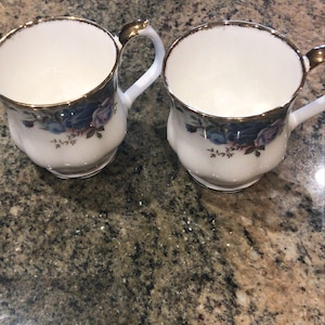 Royal Albert Moonlight rose blue rose mug 3 1/4” high bone china vintage , mint condition, gorgeous gift. Price For Each.
