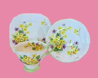 Royal Albert "Primulette" Trio gele bloem met groene bies bone china Engeland.