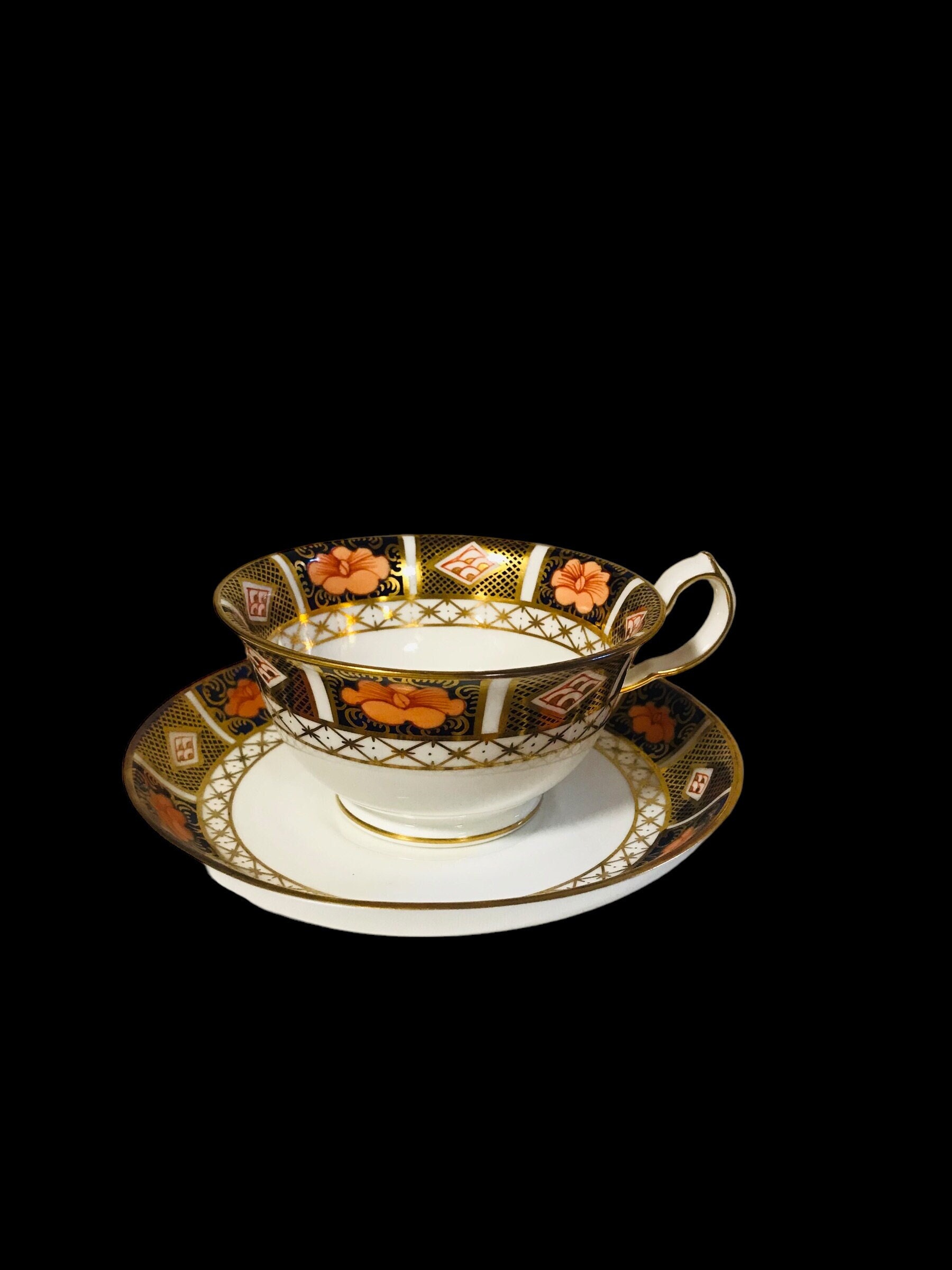 Vintage Royal Crown Derby Imari pattern tea cup and saucer bone china England, collectible classic tea cup set.