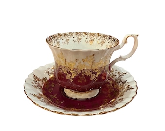 Royal Albert bone china regal series dark purple tea cup and saucer set England.