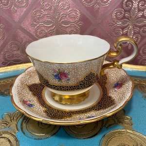 Unique star paragon spider web cobalt blue gold tea cup and saucer pink flowers and gold handle
