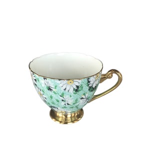 Collectible vintage Shelley footed cup orphan daisies on green with gold handle bone china England. Replacement shelley cup. Ripon shape