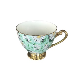 Collectible vintage Shelley footed cup orphan daisies on green with gold handle bone china England. Replacement shelley cup. Ripon shape