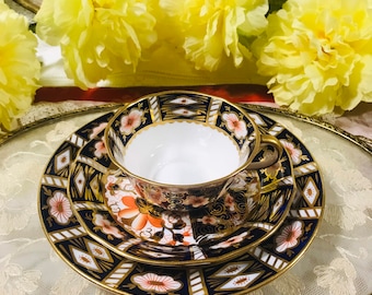 Royal Crown Derby Imari 2451 pattern trio tea cup and saucer with 7” dessert plate, mint condition, England. Gorgeous gift.