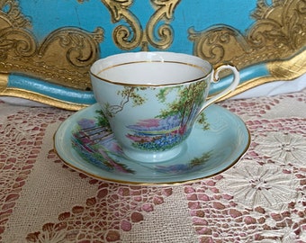 Vintage blue aynsley tea cup and saucer with sceneries, English bone china