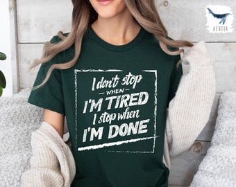 May include: A green t-shirt with a white graphic that says "I don't stop when I'm tired I stop when I'm done".