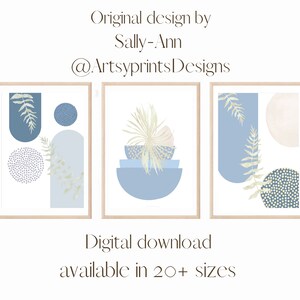 May include: Three abstract art prints with a blue, white, and beige color scheme. The prints feature geometric shapes, leaves, and dots. The text "Original design by Sally-Ann @ArtsprintsDesigns" is at the top of the image. The text "Digital download available in 20+ sizes" is at the bottom of the image.