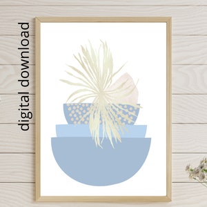 May include: A digital print featuring a stylized illustration of a plant in a stack of three blue and white bowls. The plant is a light beige color and the bowls are a light blue color with white polka dots.