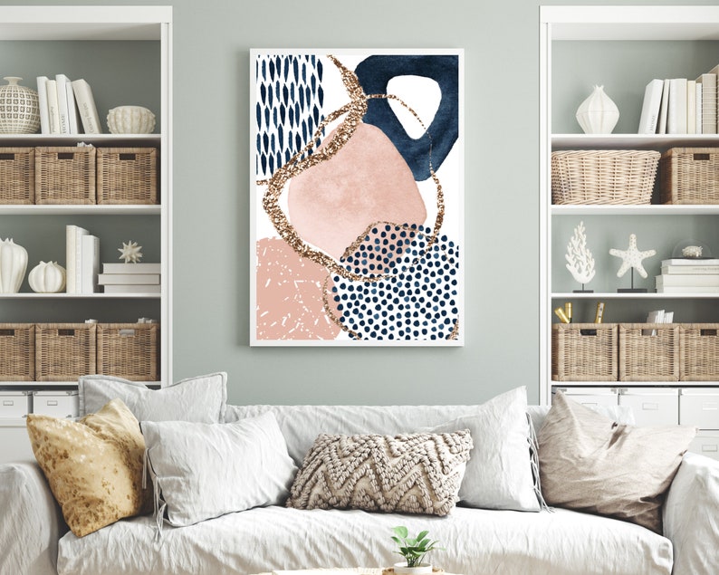 May include: Abstract art print with a white backdrop, navy blue, blush pink, and gold glitter details. The design incorporates dotted and textured patterns, offering a modern and stylish look. The artwork is framed with a white border.