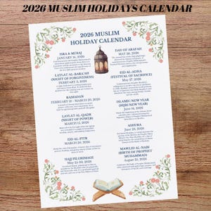 May include: A 2026 Muslim Holiday Calendar printed on paper, featuring a floral border design. The calendar lists dates for religious holidays including Isra & Mi'raj, Laylat al-Bara'ah, Ramadan, Laylat al-Qadr, Eid al-Fitr, and Hajj Pilgrimage.