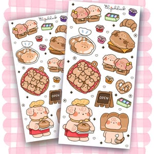 May include: Two sticker sheets featuring adorable cartoon bakery-themed characters. The stickers include images of bread, pastries, and characters dressed as bakers. The sheets have the text "Elijahdeck" and "OPEN" on them. The stickers are on a white background.