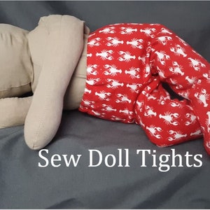 May include: Red doll tights with a white lobster print. The tights are on a doll that is lying on its side. The text "Sew Doll Tights" is visible below the doll.