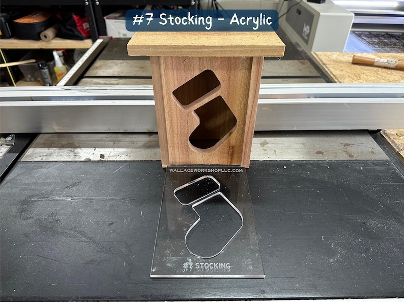 May include: A wooden box with a stocking cutout, labeled "#7 Stocking - Acrylic". A clear acrylic template of a stocking is also shown.
