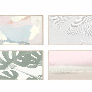 May include: Set of four framed abstract art prints. The prints feature a variety of colors and patterns, including pink, blue, green, and white. The prints are all in a minimalist style and would look great in any modern home.