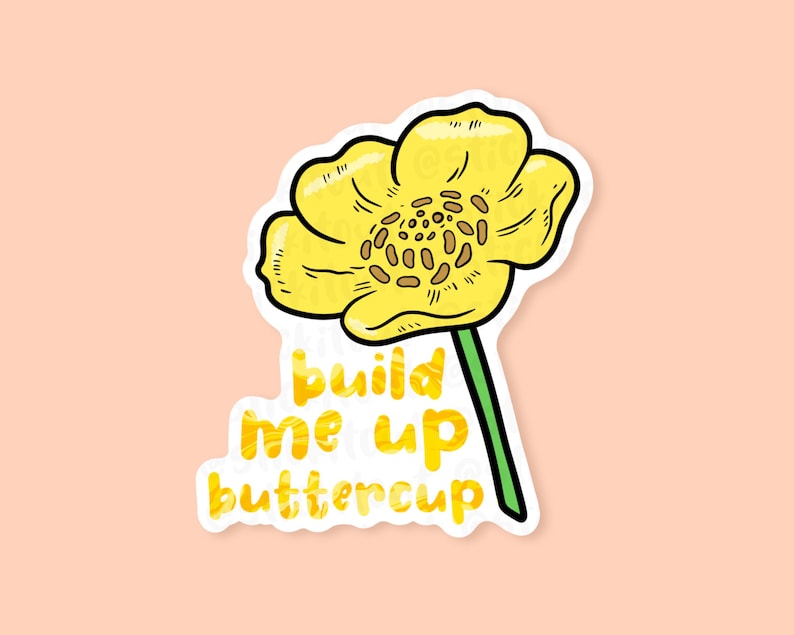 Build me up buttercup vinyl sticker placed on a peach background.