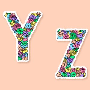 Peach background with Y & Z of the floral letter sticker designs spaced across. Each letter a variety of flowers & leaves in the shape of each letter of the alphabet, the flowers & leaves in a variety of colours.