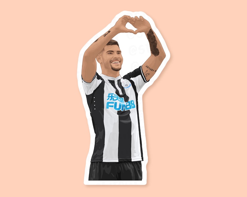 Peach background with the Bruno Guimaraes sticker design, wearing the classic Newcastle home kit, he is smiling widely with his hands above his hand in a heart shape, this design is printed with a thin white border.