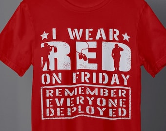 May include: Red t-shirt with a white graphic that says "I wear red on Friday. Remember everyone deployed."