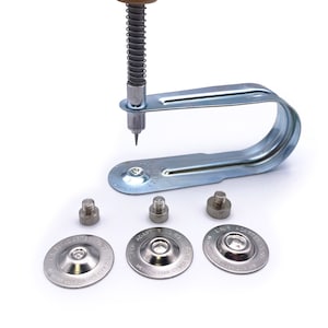 May include: A silver metal tool with a wooden handle and a spring-loaded punch. The tool is used to attach metal snaps to fabric. Three metal snaps are also shown in the image.