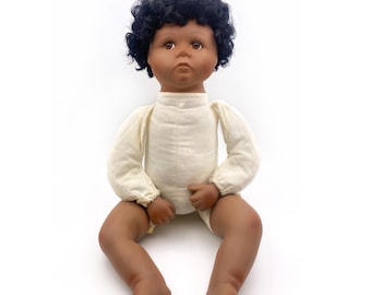 Sitting Suzy: Vintage Porcelain Baby Doll with Soft Body and Jointed Legs, Dark Skin Tone, 20" L Overall
