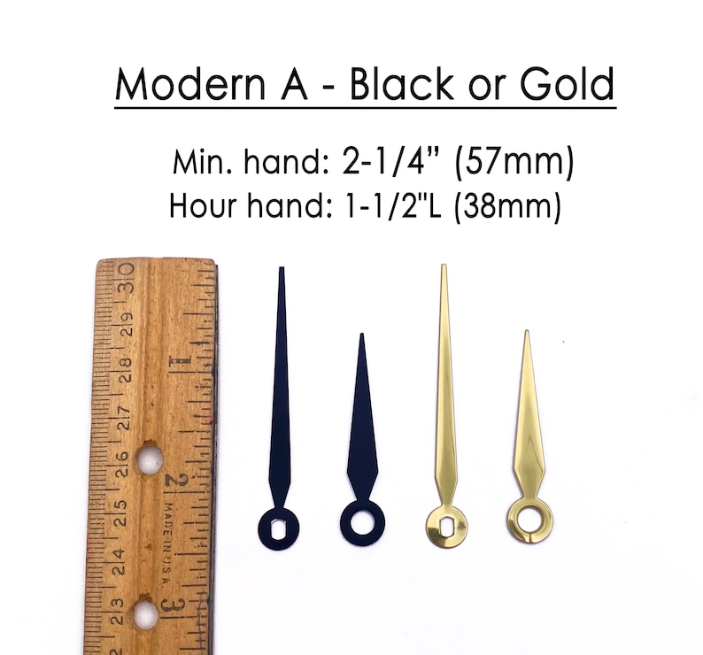 K&ouml;nnte beinhalten: Uhrzeiger in Schwarz und Gold. Das Bild zeigt zwei schwarze und zwei goldene Uhrzeiger mit einem Lineal als Ma&szlig;stab. Der Text lautet "Modern A - Black or Gold". Der Minutenzeiger ist 57 mm und der Stundenzeiger 38 mm lang.