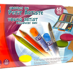 May include: A wooden box with a blue and white art supply set inside. The box has a red and purple background with the text "Coffret du Petit Artiste Young Artist Discovery Box" and "68 pieces". The art set includes colored pencils, crayons, pastels, paint, brushes, and paper.