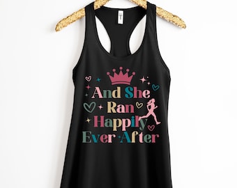 May include: Black tank top with a graphic print of a crown, hearts, and the text "And She Ran Happily Ever After".