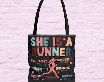 May include: Black tote bag with a colorful design that says "She is a Runner" and lists words like "Disciplined", "Courageous", "Faithful", "Strong", "Purposeful", "Enduring", and "Focused" with bible verses.