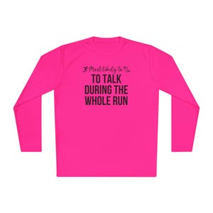 May include: Pink long-sleeve running shirt with black text that reads "Most likely to talk during the whole run".