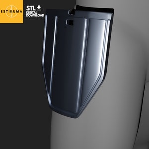 May include: A dark blue, 3D printed, plastic shield with a rectangular hole in the top. The shield is designed to be worn on the body and has a smooth, glossy finish.