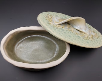 Handmade ceramic green pots with lids,useful as small butter dishes,hand shaped and glazed