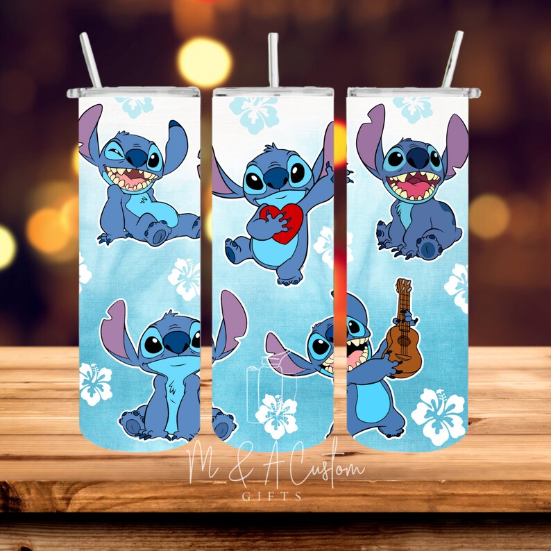 May include: Three stainless steel tumblers with a blue background and white hibiscus flowers. Each tumbler features a different image of Stitch from Lilo & Stitch, including Stitch holding a heart, playing a ukulele, and sitting with a mischievous grin.