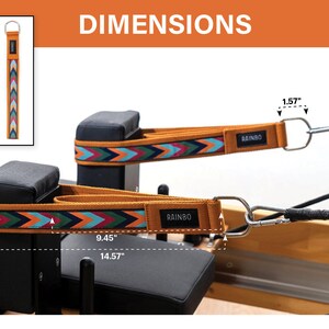 May include: Two brown straps with colorful chevron patterns and the word "RAINBO" printed on them. The straps are 1.57 inches wide and 14.57 inches long. The straps are attached to a black metal frame with a silver hook.