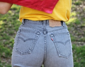 Vintage black 501 levis jeans size 25
