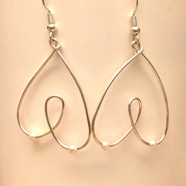 Light silver boobie earrings