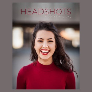 May include: A woman with long dark hair is smiling and laughing. She is wearing a red turtleneck sweater. The background is blurred and out of focus. The text "HEADSHOTS Your Studio Photography" is at the top of the image.