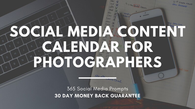 May include: A laptop computer, a smartphone, a pen, and a notebook with handwritten notes are on a wooden table. The notebook has the text "SOCIAL MEDIA CONTENT CALENDAR FOR PHOTOGRAPHERS" written on it. Below the text is a line and the text "365 Social Media Prompts 30 DAY MONEY BACK GUARANTEE".