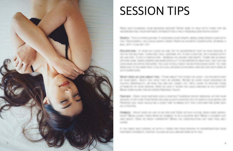 May include: A woman with long dark hair lies on a white bed with her arms crossed over her chest. She is wearing a black bra and has her eyes closed.